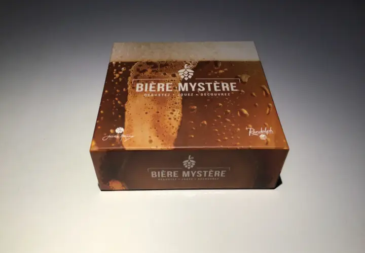 Boîte de jeu "Bière Mystère" avec une illustration de bière mousseuse. Parfait pour une soirée biere 80.